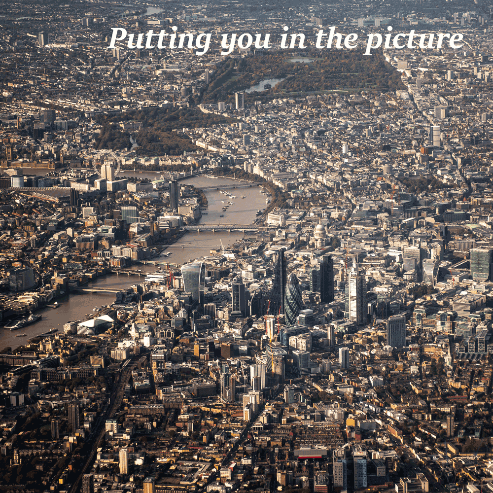 Aerial view of the City of London, Thames, Houses of Parliament, Buckignham Palace etc.